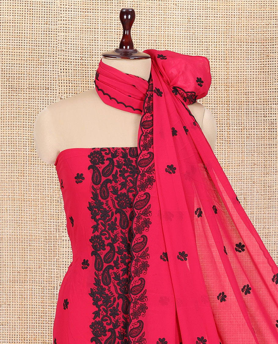 Rani Pink-Black Georgette Material Churidar Features Floral-Paisley Embroidery Top, a American Crepe Bottom, a Scallop Embroidered Dupatta