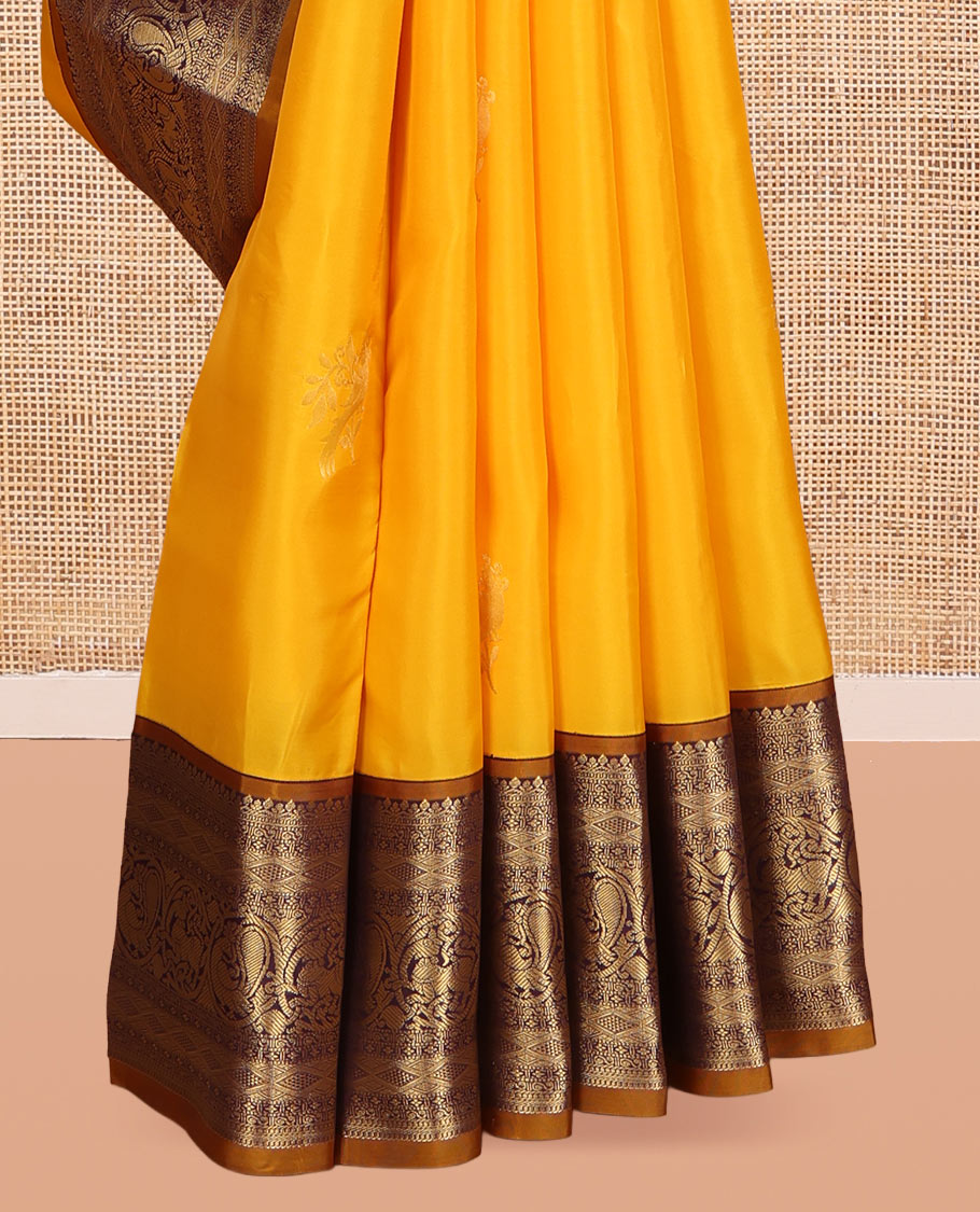Yellow Vasundhara Lite Silk Mix Saree, Sparsely Woven with Zari Buttas, a Contrast Border of Mayil and Yaali Designs, Grand Pallu, and a Contrast Blouse