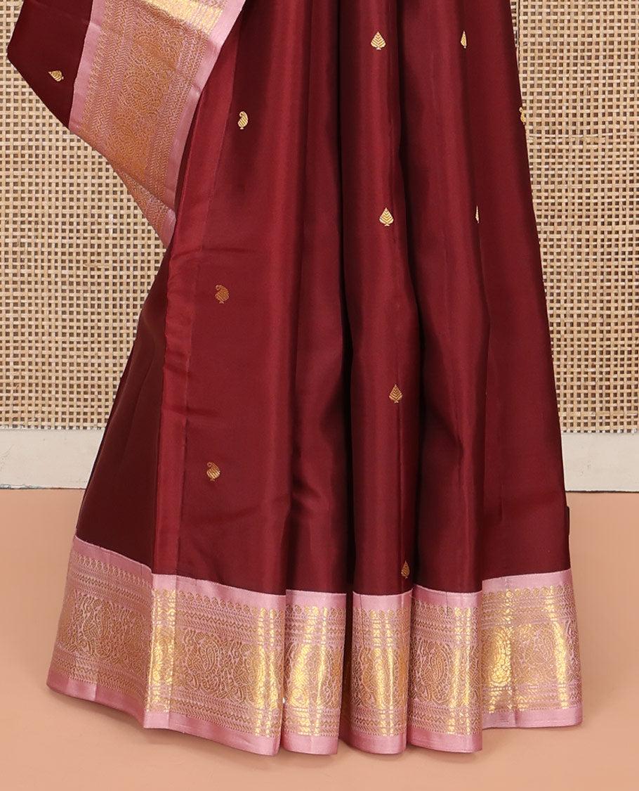 Maroon Vasundhara Silk Saree, Embellished with Zari Buttas All Over Its Body, Complemented by a Contrast Border of Manga, Banaras, Muthu, Neli, and Mayil Designs, Grand Pallu, and Paired with a Contrast Blouse