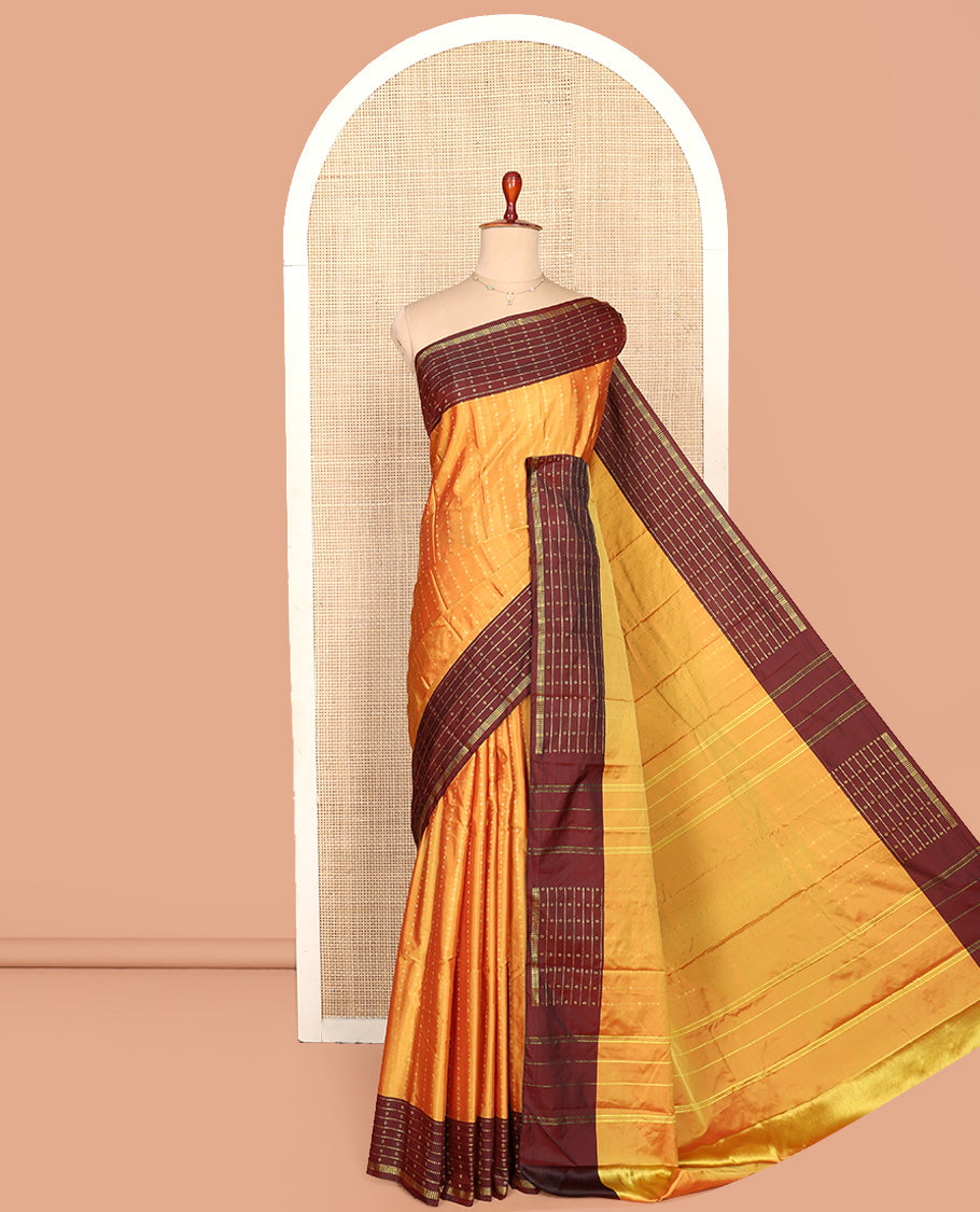 Yellow Aarani Silk Saree, Lightly Embellished with Zari Buttas All Over Its Body, Complemented by a Contrast Zari Design Border, Pallu of Stripes, and Paired with a Matching Blouse