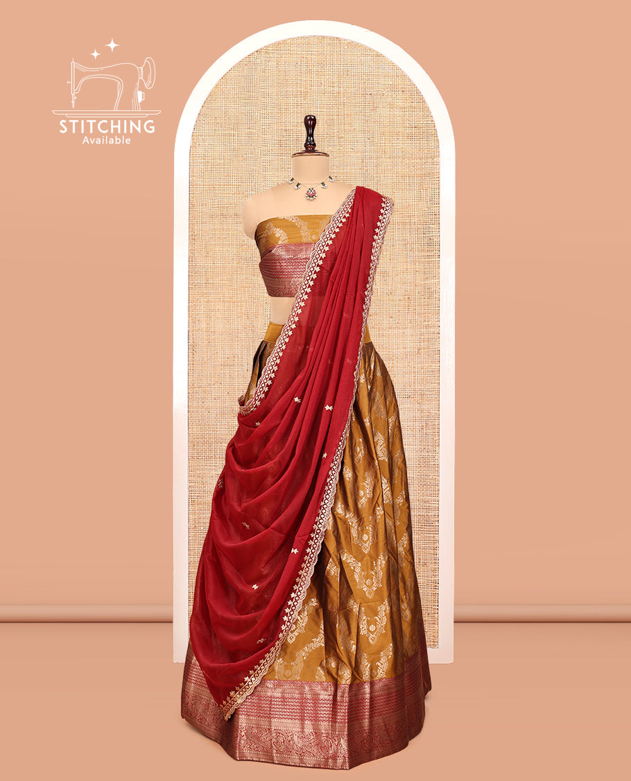 Mustard-Red Banarasi Half-Saree, Accentuated with Jacquard Design, a Contrast Traditional Zari Border, a Matching Blouse, and a Contrast Embroidered Dhavani