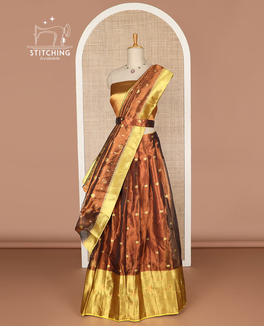 Dark brown buttas tissue half saree with contrast zari design border, checked zari design blouse & floral design dhavani