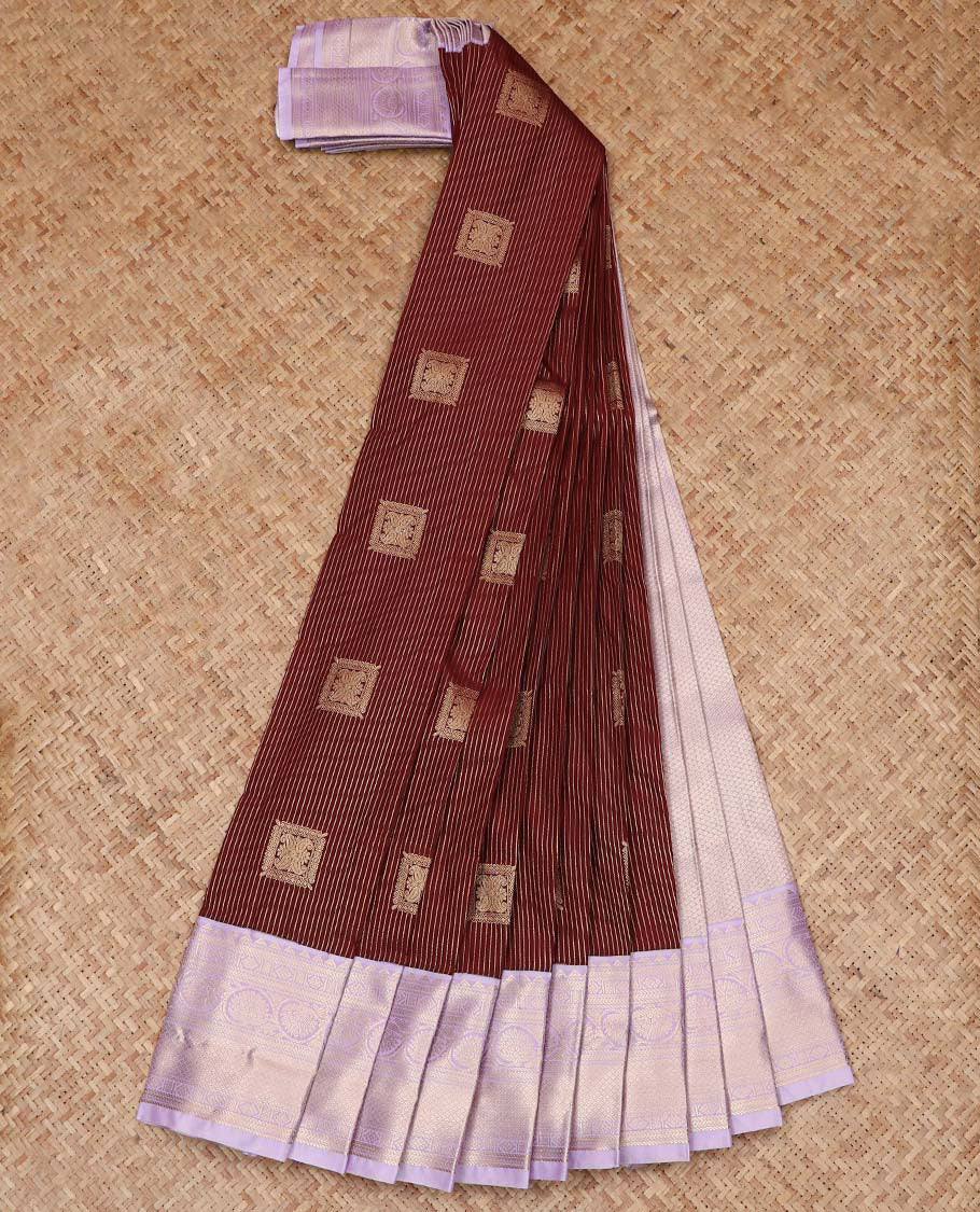 Maroon Budget Silk Saree Gracefully Embellished with Zari Buttas and Zari Stripes, Highlighted with a Contrast Traditional Zari Design Border, Featuring a Pallu of Jaal Design, and Paired with a Contrast Blouse