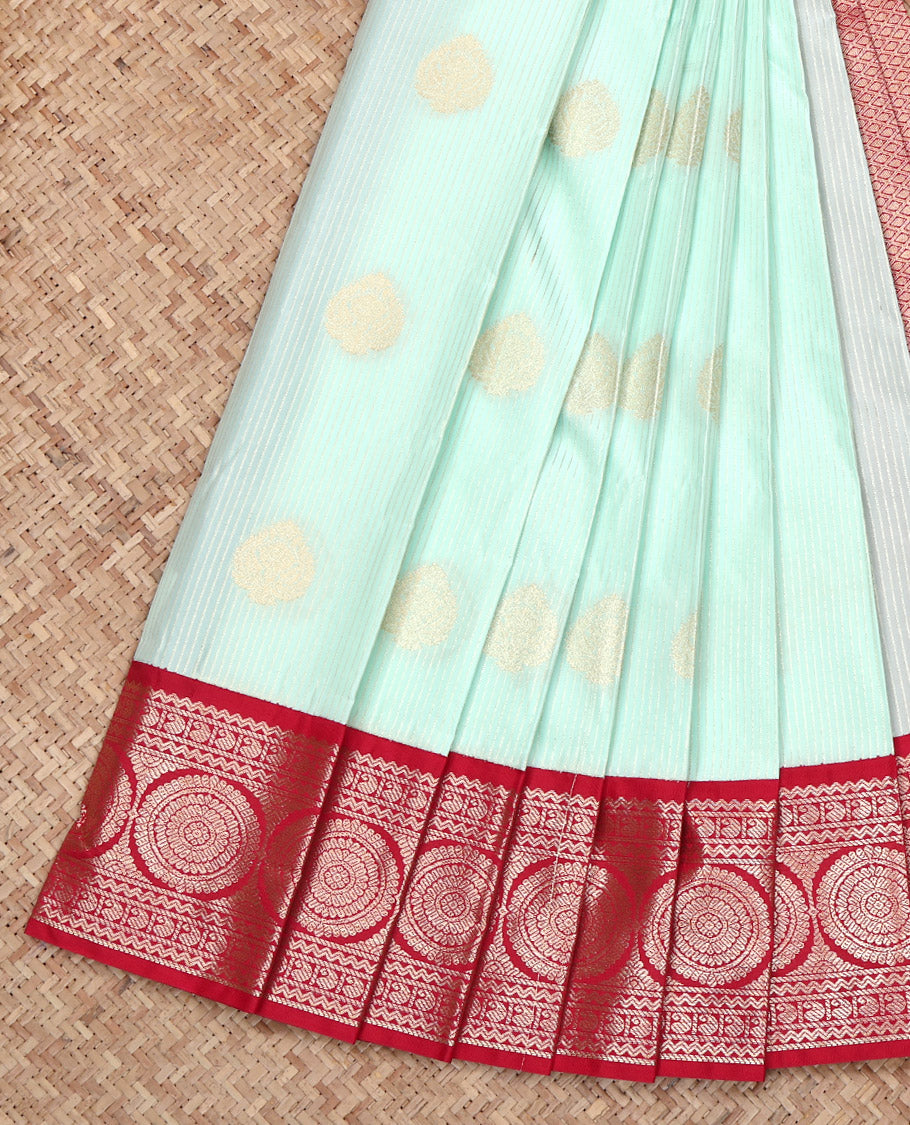 Turquoise Budget Silk Saree, Embellished with Zari Buttas All Over Its Body, Complemented by a Contrast Traditional Zari Design Border, Grand Jaal Pallu, and Paired with a Contrast Blouse