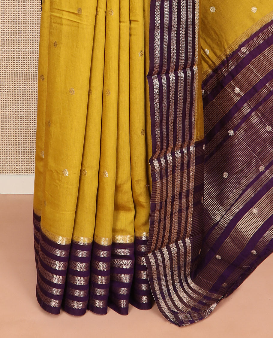 Yellow zari buttas woven Assam silk saree, contrast big border of traditional zari designs, and pallu of zari buttas and zari stripes