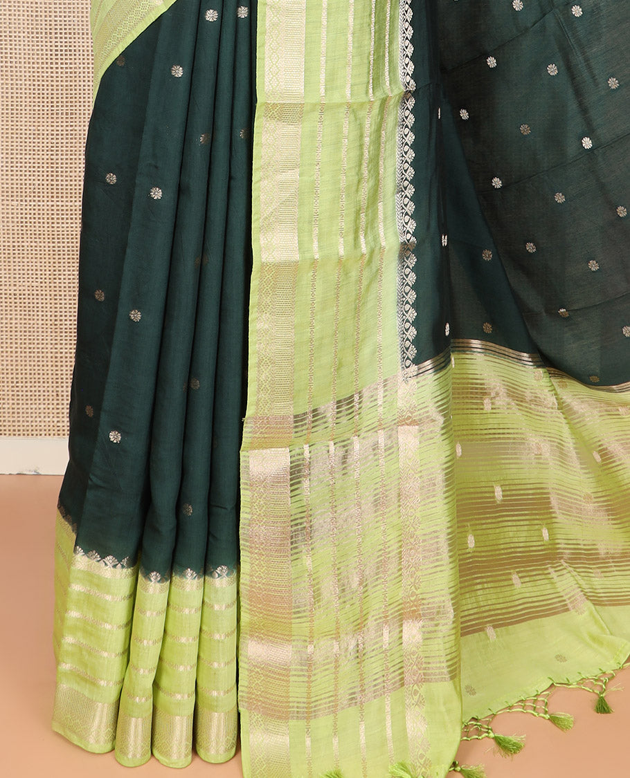 Dark Green Assam Silk Embellished with Floral Zari Buttas, Complemented by Contrast Traditional Zari Design Border, a Gleaming Pallu of Zari Stripes, and Paired with a Contrast Blouse