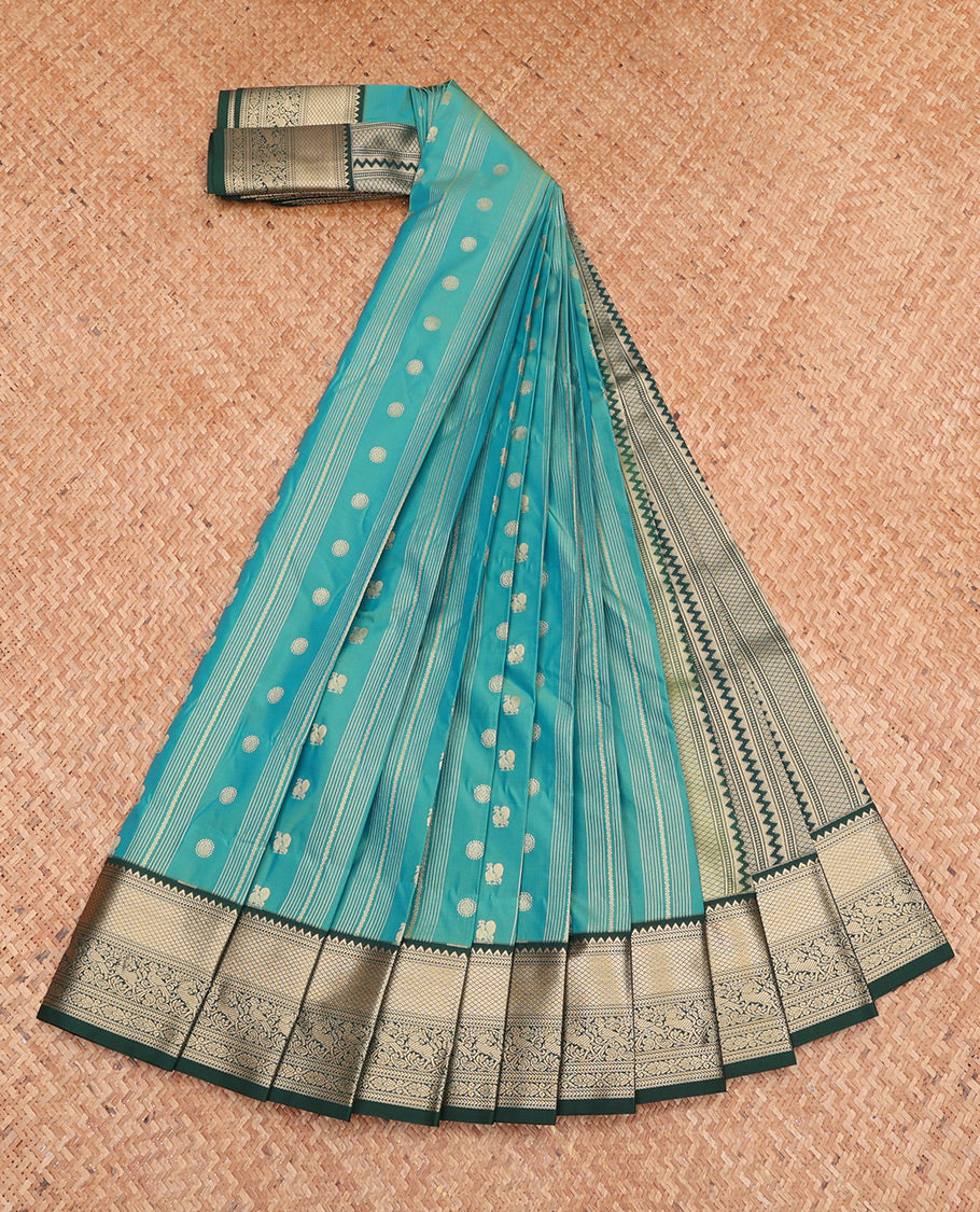 Blue Budget Silk Saree, Artfully Detailed with Peacock-Chakra Buttas and Stripes, Complemented by a Contrast Traditional Zari Border, Geometric Pallu, and Contrast Blouse