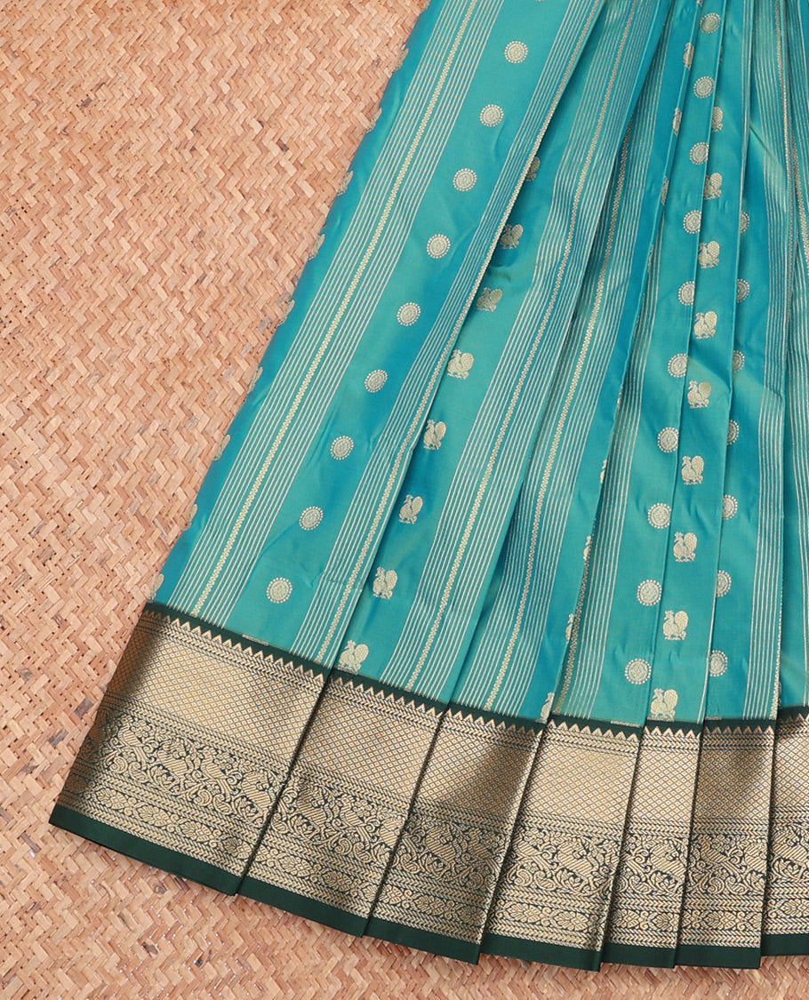 Blue Budget Silk Saree, Artfully Detailed with Peacock-Chakra Buttas and Stripes, Complemented by a Contrast Traditional Zari Border, Geometric Pallu, and Contrast Blouse