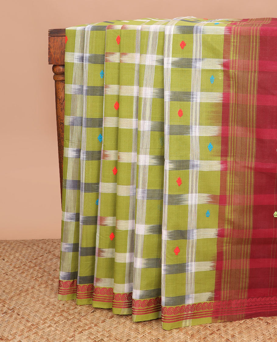 Green buttas and checked Andhra cotton saree, paisley border, and contrast pallu of stripes and buttas