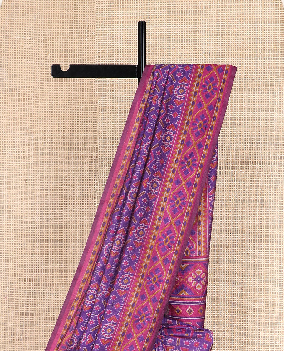 Violet intricately ikkat woven semi-banaras patola silk saree, diamond patterned border, and diamond patterned pallu