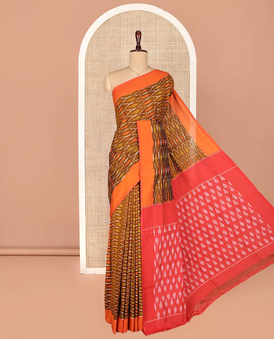 Brown Ikkat Cotton Saree, Decked Up with Ikkat-Style Ogee Patterns on Its Body, Complemented by Contrast Plain Border, Pallu Steeped with Ikkat Buttas, and Has No Blouse