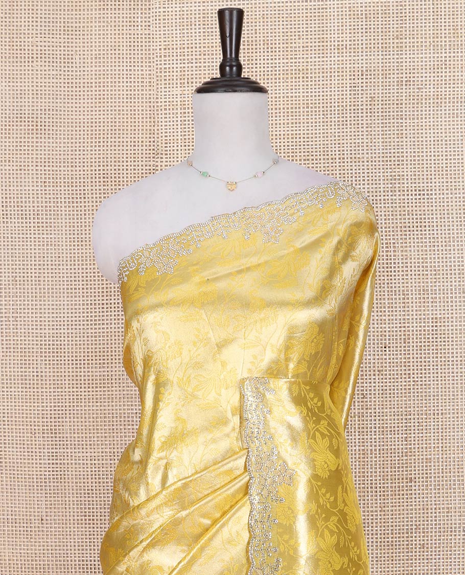 Yellow Designer Saree, Enriched with Floral Jaal Jacquard on Its Body, Highlighted by a Scallop Stone Embroidered Border, Majestically Detailed Pallu, and Paired with a Matching Blouse