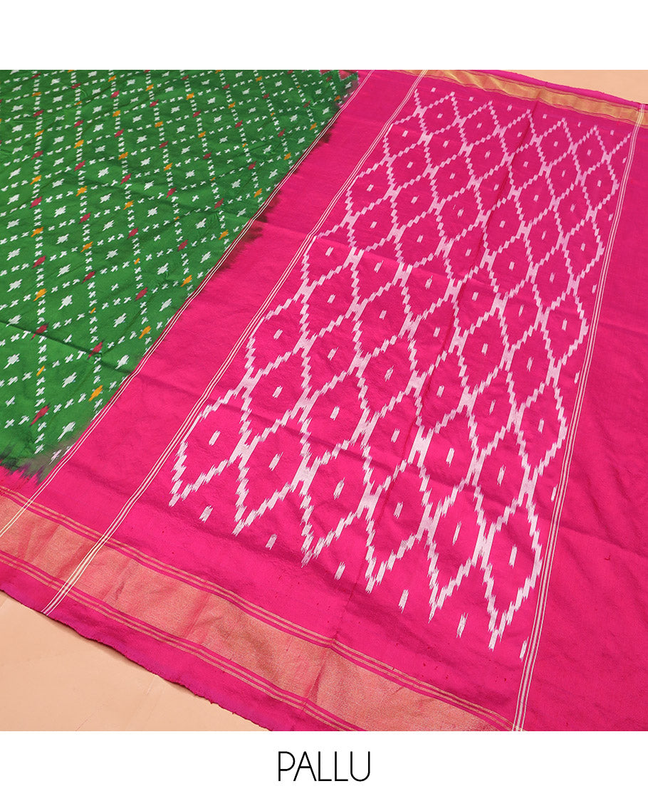 Green Ikkat Silk Saree with Ikkat Buttas Enclosed Jaal Design, Spotlighted with a Contrast Temple Border, Pallu Features Ikkat Jaal Patterns, and with a Contrast Blouse
