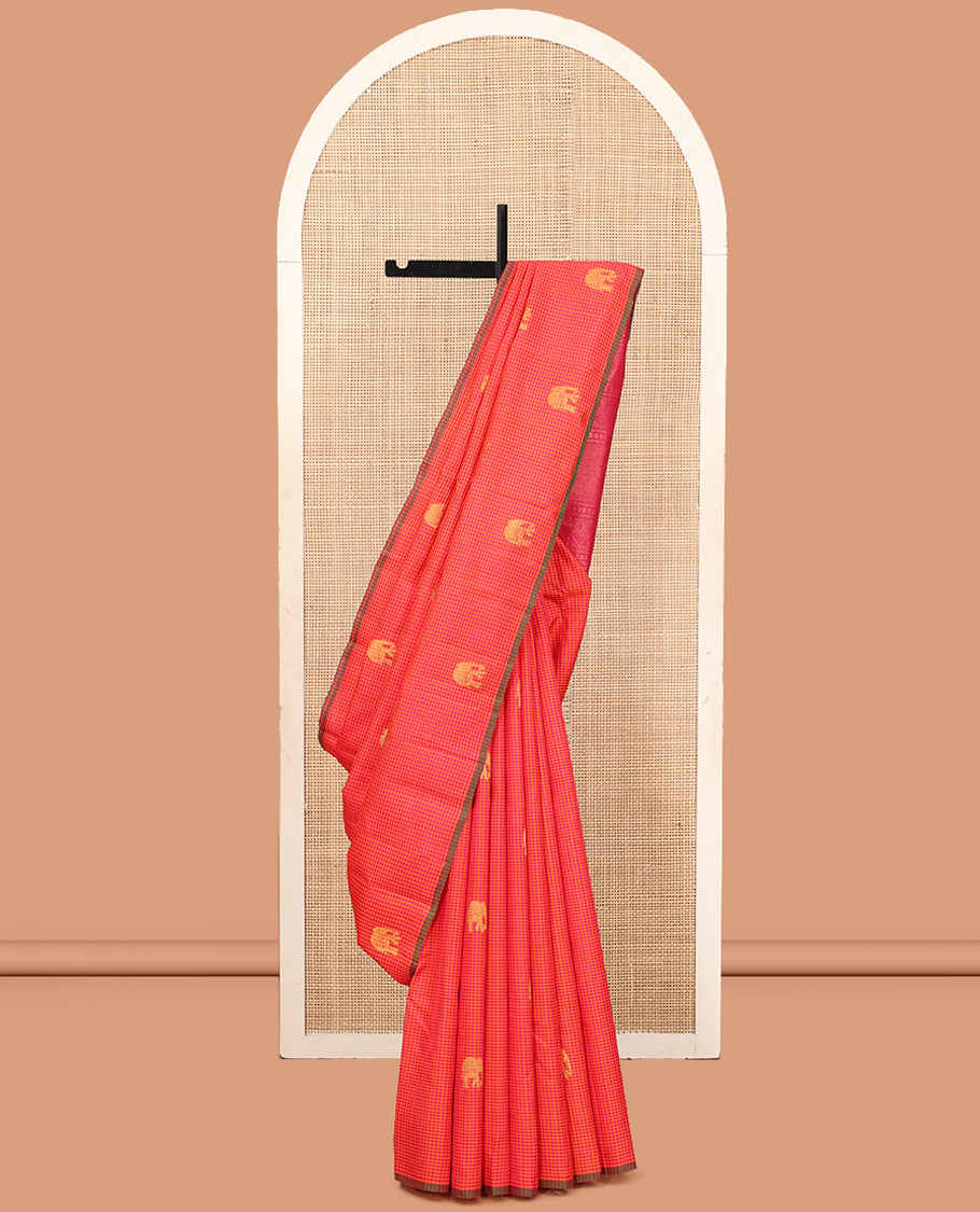 Borderless Orange-Pink Kasa-Kasa Checked Kanchipuram Silk Saree Adorned with Yaanai Buttas, Grand Pallu, and a Matching Blouse