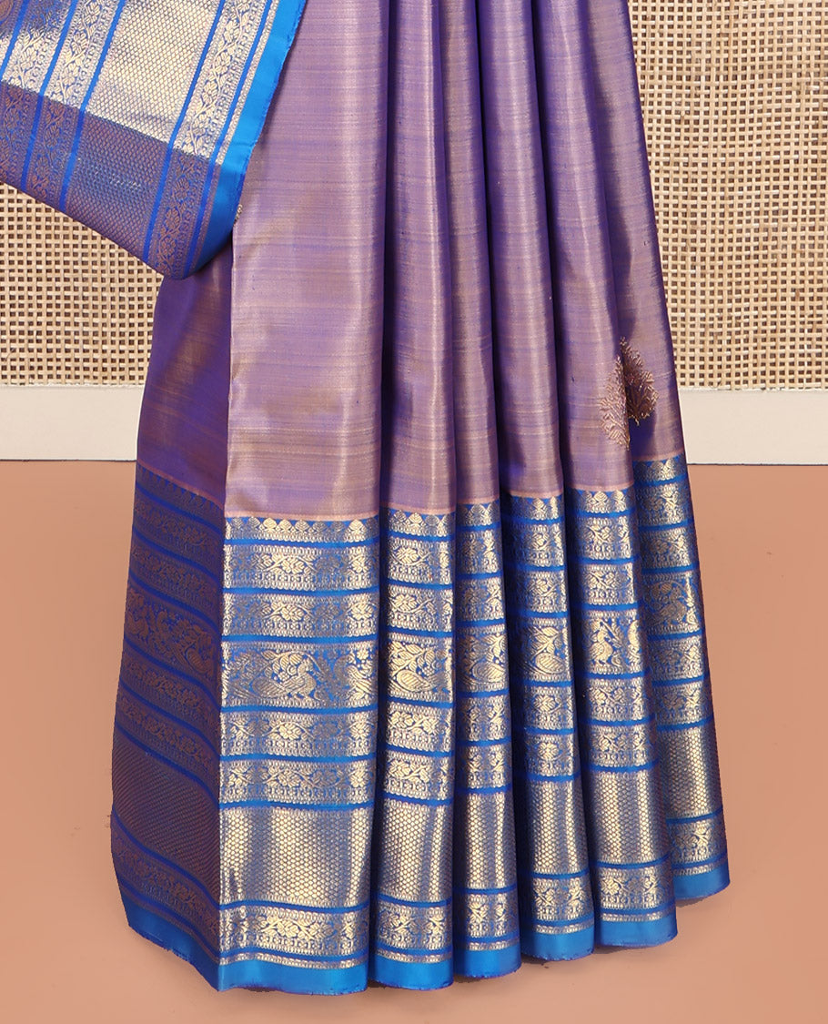 Blue Dual-Tone Kanchipuram Silk Saree, Detailed with Zari Buttas All Over Its Body, Complemented by a Contrast Border of Thilakam Mokku, Kodi Visiry, Mayil, and Kuyil Kann Designs, Grand Pallu of Kodi Visiry Designs, and Paired with a Contrast Blouse