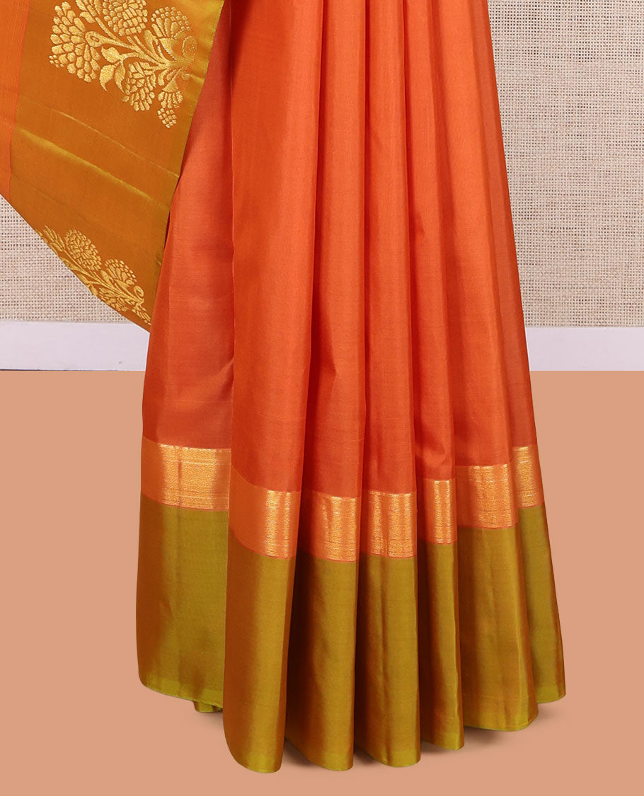 Orange Kanchipuram Silk Saree, Elevated with Floral Zari Buttas, a Contrast Floral Zari Buttas, Grand Floral Pattu, and a Contrast Blouse