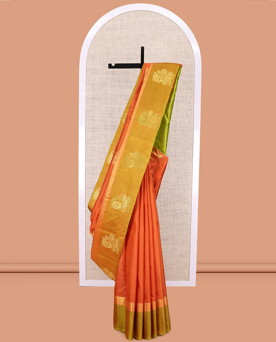 Orange Kanchipuram Silk Saree, Elevated with Floral Zari Buttas, a Contrast Floral Zari Buttas, Grand Floral Pattu, and a Contrast Blouse