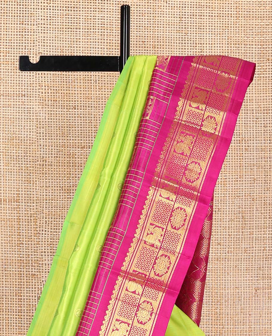 Green floral buttas kancheepuram silk saree with contrast floral design border & intricate zari design pallu