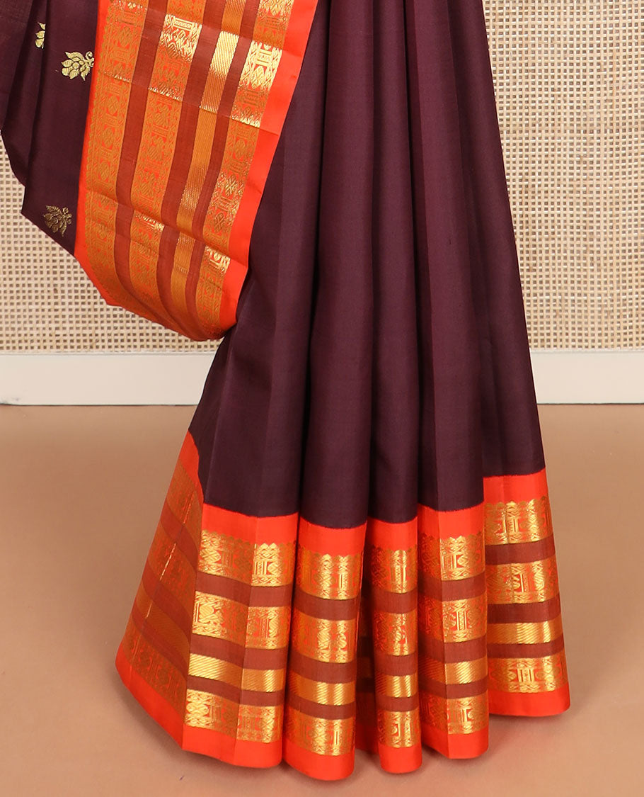 Maroon zari buttas kanchipuram silk saree, contrast one-sided korvai border of salngai,neli,rudraksham, & mayil & paisley design pallu