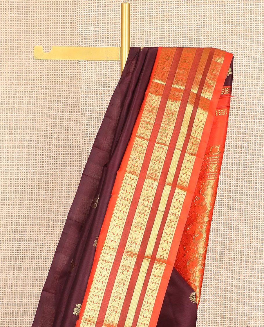 Maroon zari buttas kanchipuram silk saree, contrast one-sided korvai border of salngai,neli,rudraksham, & mayil & paisley design pallu