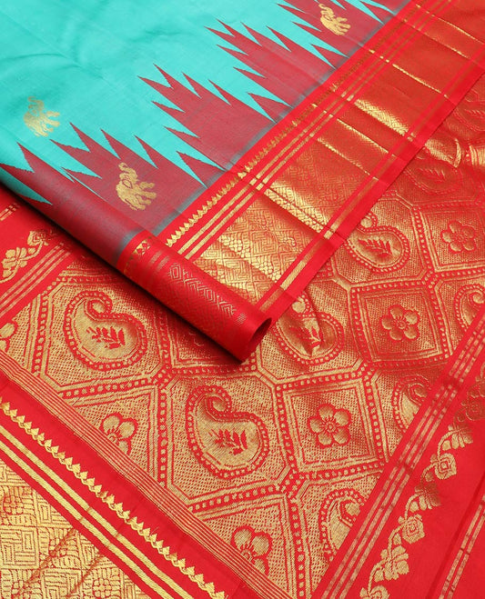 Turquoise yaanai buttas kanchipuram silk saree, contrast thazampoo rekku one-sided border of thilakam mokku,banaras & jaal & butta enclosed jaal pallu