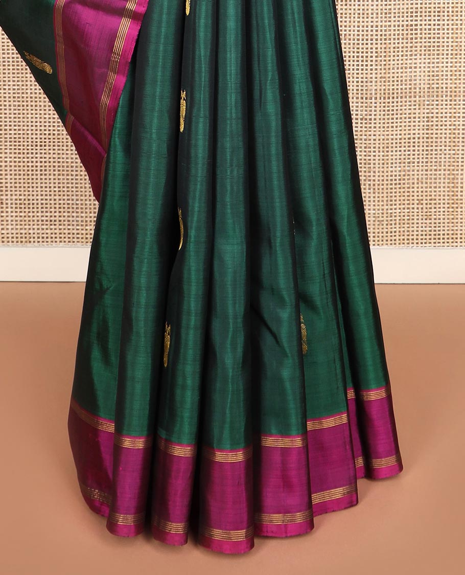Green iruthalai pakshi buttas Kanchipuram silk saree, contrast rettai pettu border, and pallu of muthu stripes, and arumbu manga designs