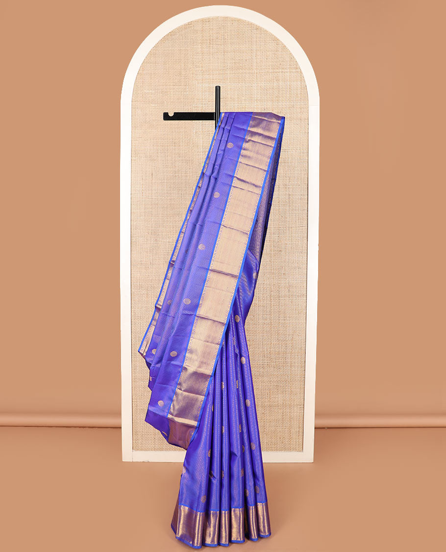 Blue mayil chakram buttas Kanchipuram silk saree, zari border of rudraksham and diamond designs, and intricate pallu