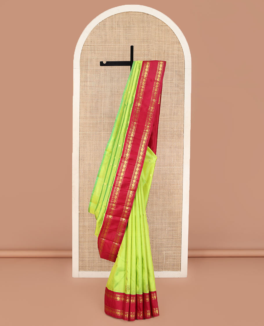 Parrot Green Kanchipuram Silk Saree, Adorned with Zari Buttas and Mayil Buttas on Its Body, Complemented by a Contrast One-Sided Korvai Border of Rekku, Banaras, and Rudraksham Designs, Pallu of Zari Designs, and Comes Without a Blouse