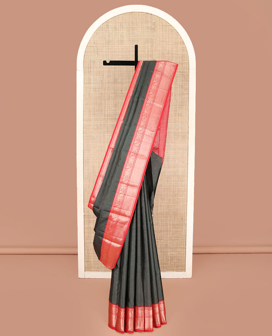 Green Kanchipuram Silk Saree, Bedecked with Stripes All Over Its Body, Complemented by Contrast Border of Mayil, Yaanai, Kamalam, and Mayil Kann Designs, Gleaming Zari-Striped Pallu, and Paired with a Contrast Blouse