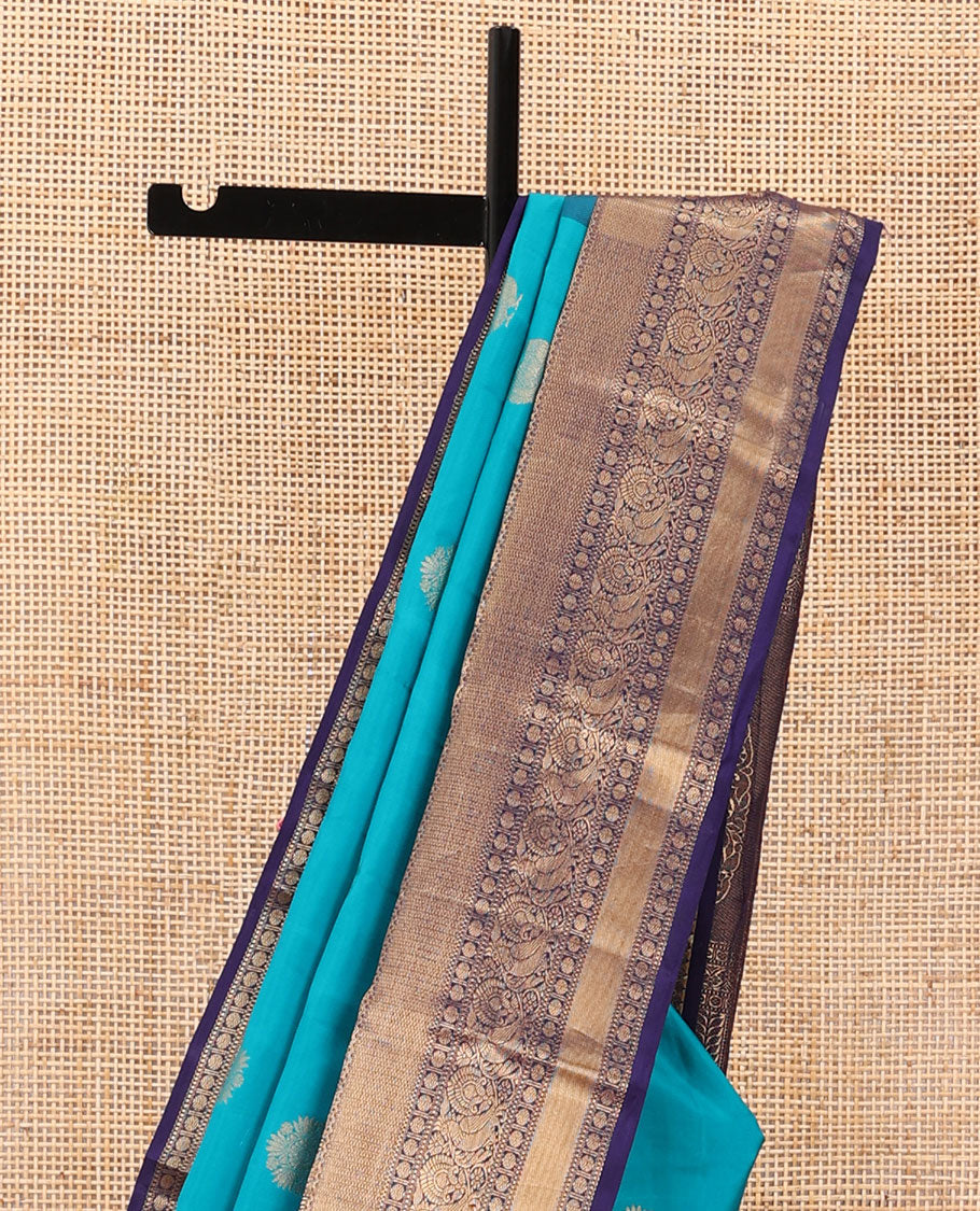Blue zari buttas silk saree, contrast border of thilakam mokku,rettai neli,chakram,mayil kann, rudraksham & mayil & intricate pallu
