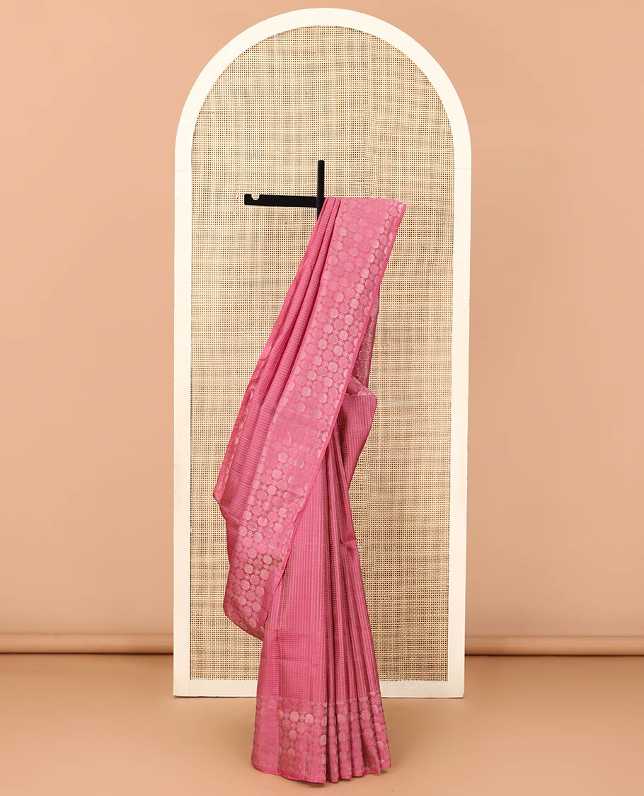 Pink muthu striped soft silk saree, self-border, and pallu steeped with geometric patterns