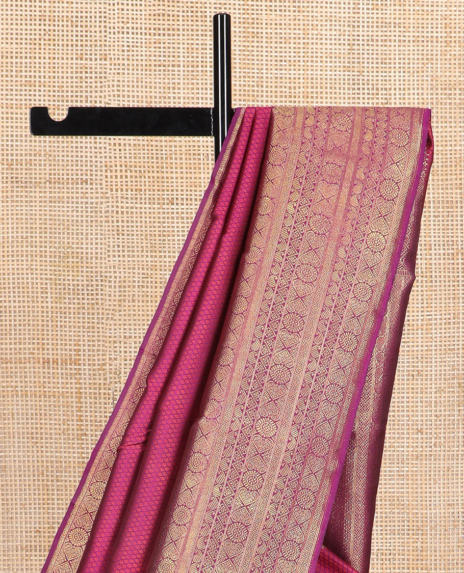 Magenta jaal design silk saree with self zari border of manga, poo chakram design & floral design pallu