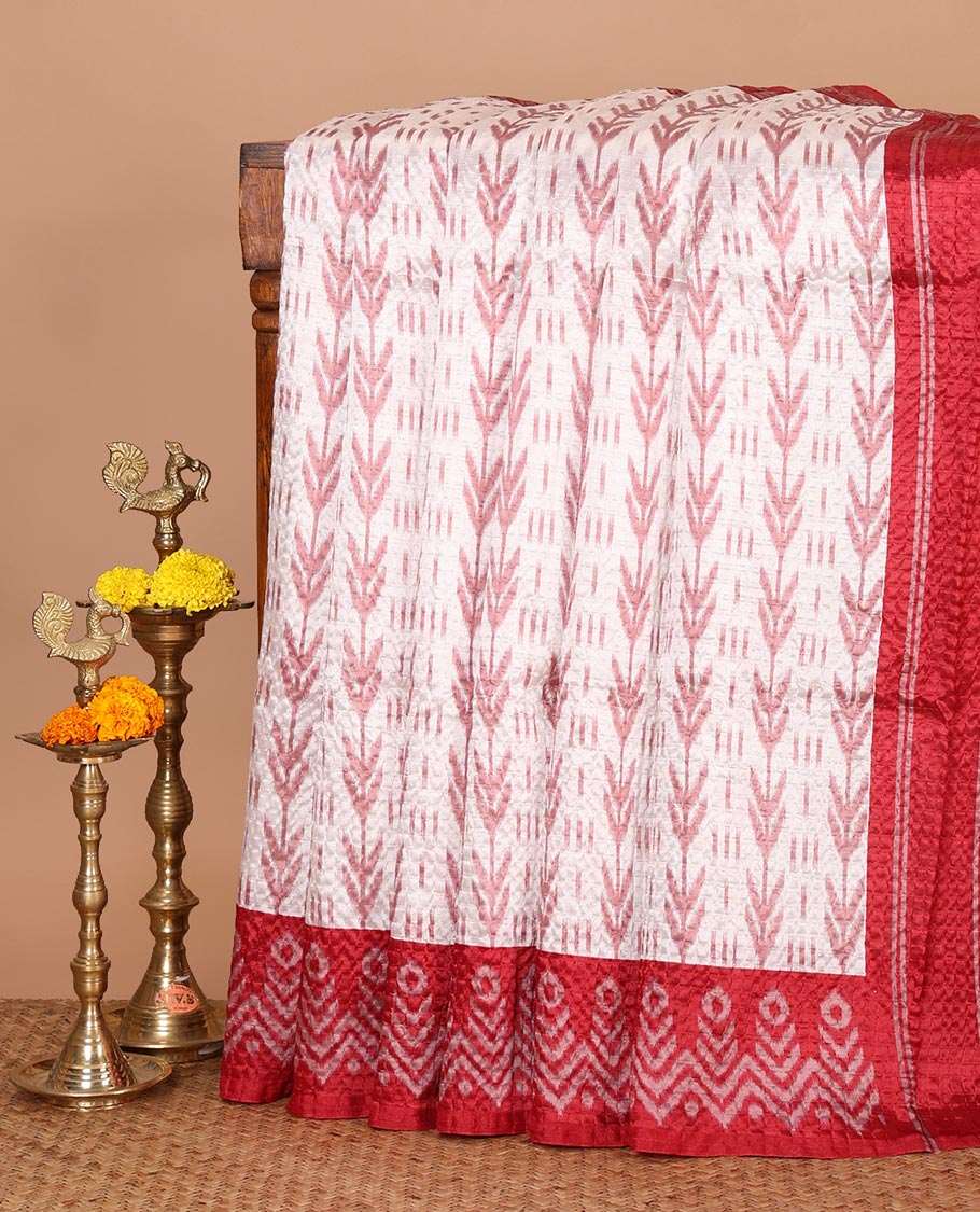 White ikat-style printed Litchi crushed saree, contrast red ikat border, pallu of ikat chevron & dots & ikat printed blouse