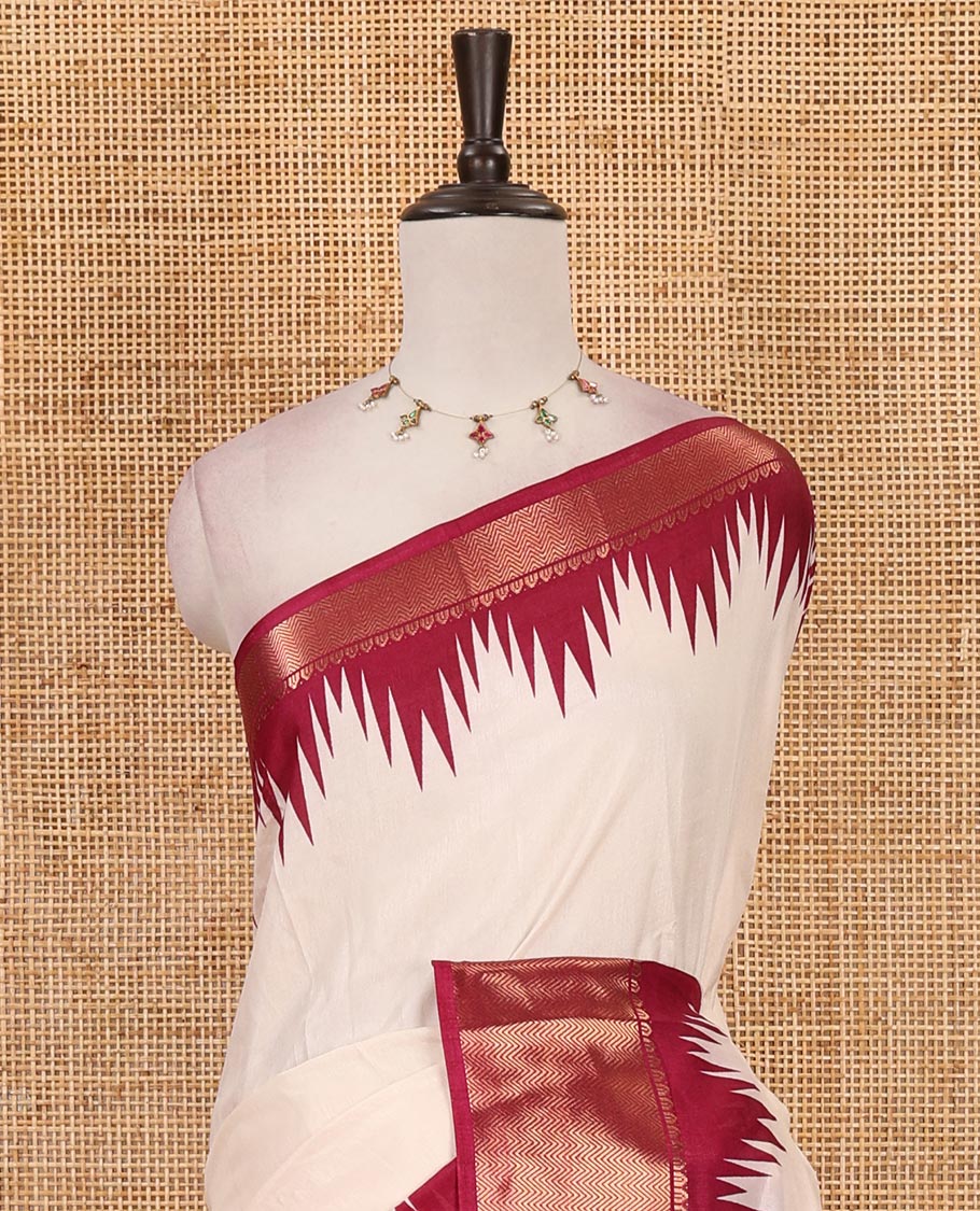 Cream-wine plain dola-tussar saree, contrast temple zari border, patola animal motifs enclosed jaal printed pallu & patola printed blouse