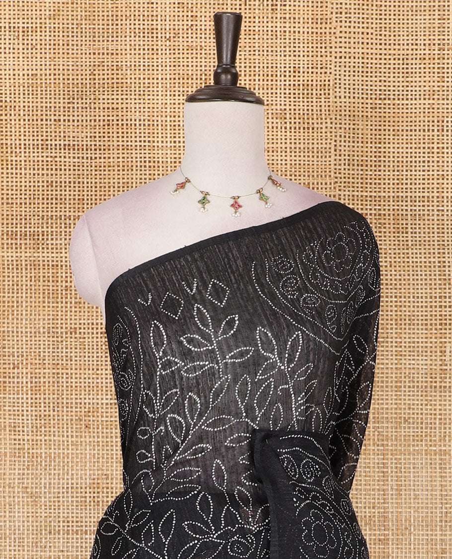 Borderless black bandhani style floral, paisley, and chakra printed semi-jute silk saree, contrast ajrakh printed pallu, and ajrakh printed blouse