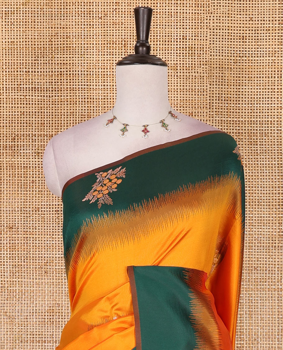 Yellow-green floral buttas elite soft silk saree, contrast floral buttas border, and pallu of Mughal-style intricate zari designs