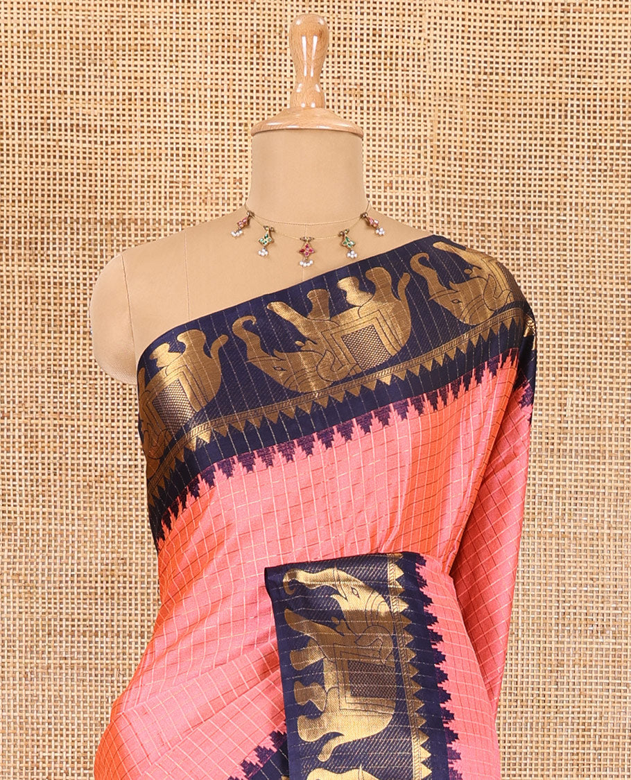Pink zari checked semi-taffeta saree, contrast satin temple border of elephant motifs, striped pallu, and a contrast striped blouse