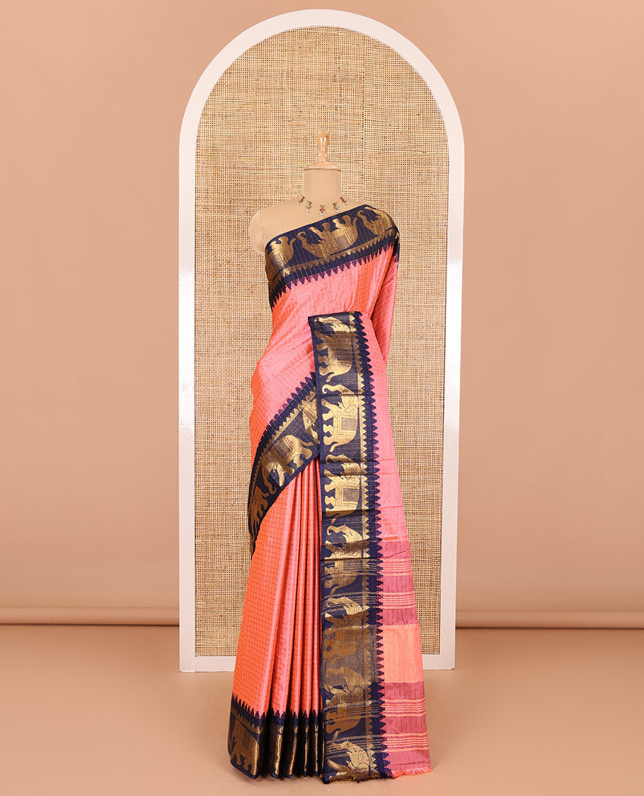 Pink zari checked semi-taffeta saree, contrast satin temple border of elephant motifs, striped pallu, and a contrast striped blouse