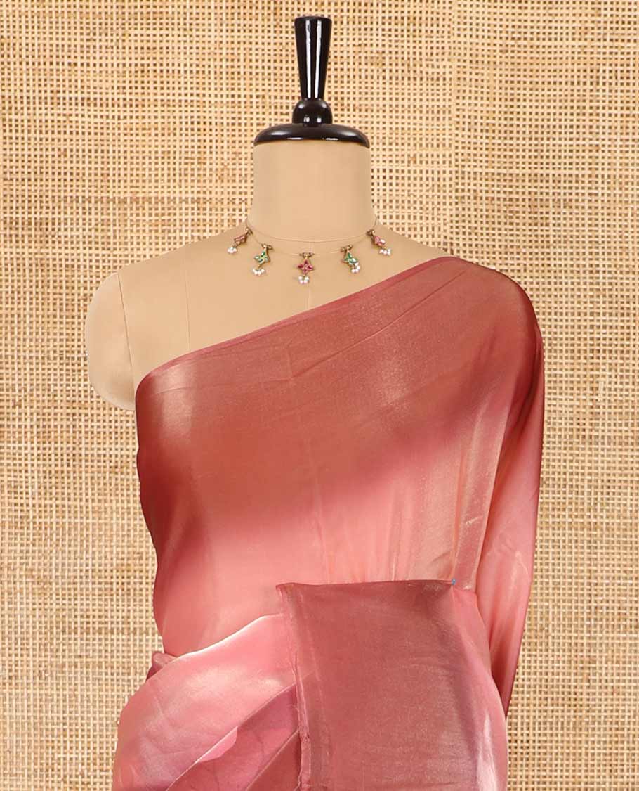 Borderless peach floral motifs printed fendy satin saree with a self-pallu and a matching blouse
