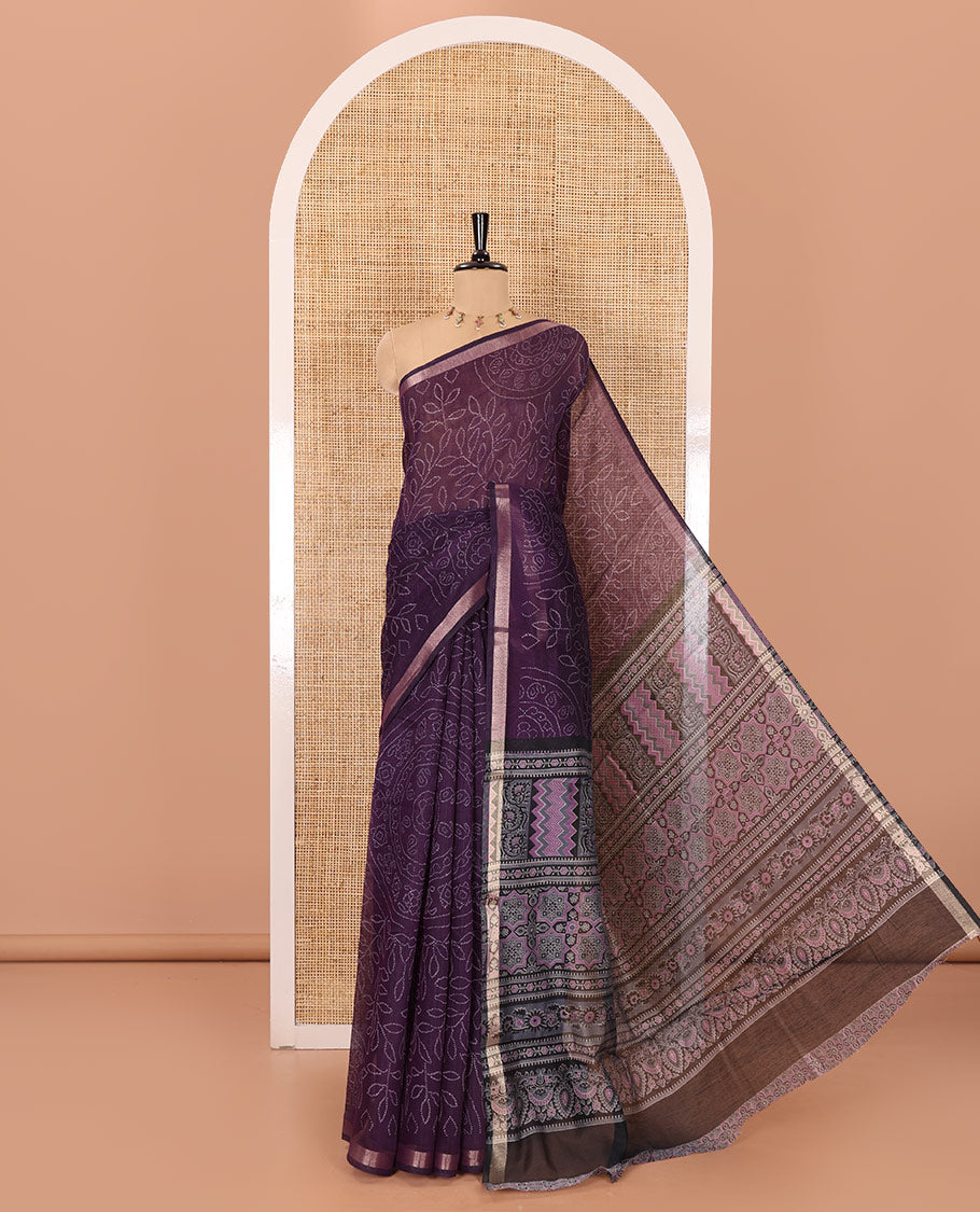 Dark violet bandhani-style floral and chakra printed saree, zari piping border, contrast ajrakh printed pallu, and contrast ajrakh printed blouse