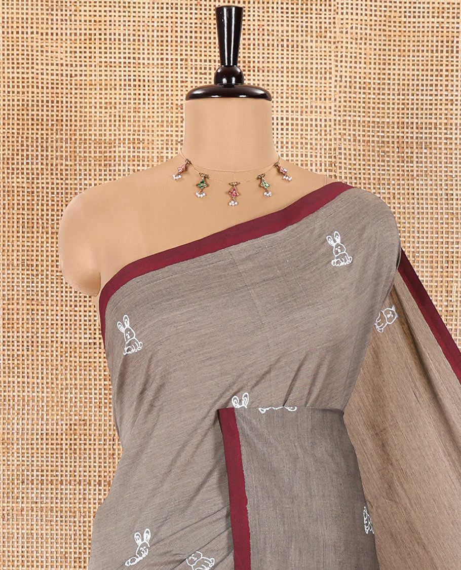 Grey South Cotton Saree Featuring Bunny Motifs Print, Highlighted with a Contrast Piping Border, and a Contrast Paisley Vine Block Printed Blouse