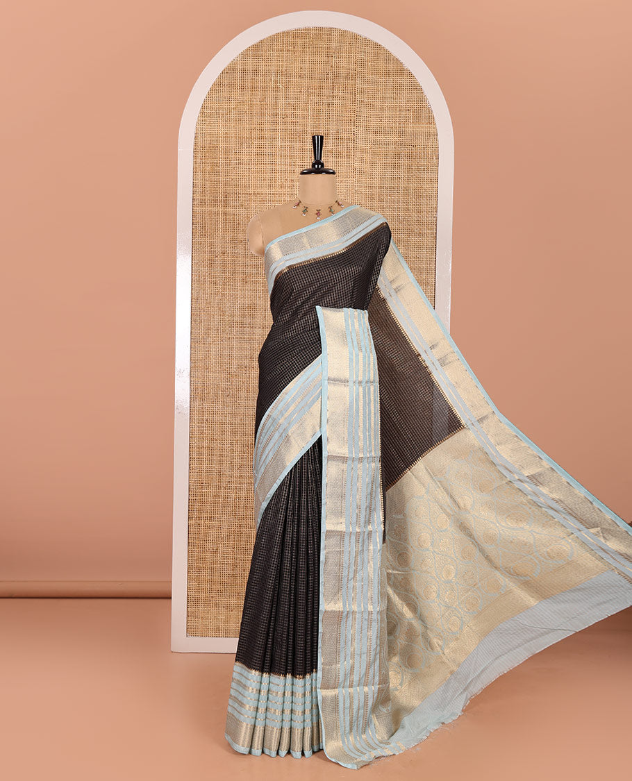 Black and Blue Semi-Mysore Crepe Saree Gleamed Up with Micro-Checks, Complemented by Contrast Traditional Zari Design Border, Gracefully Embellished Pallu of Thilakam Designs, and Paired with a Contrast Blouse