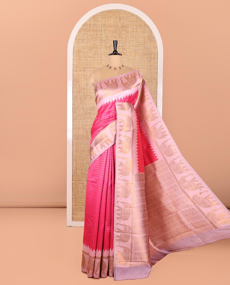 Rani Pink Kanchi Silk Saree, Detailed with Zari Checks All Over Its Body, Complemented by Contrast Traditional Zari Temple Border of Elephant Motifs, a Gracefully Woven Pallu of Geometric Patterns, and Paired with a Contrast Brocade Blouse