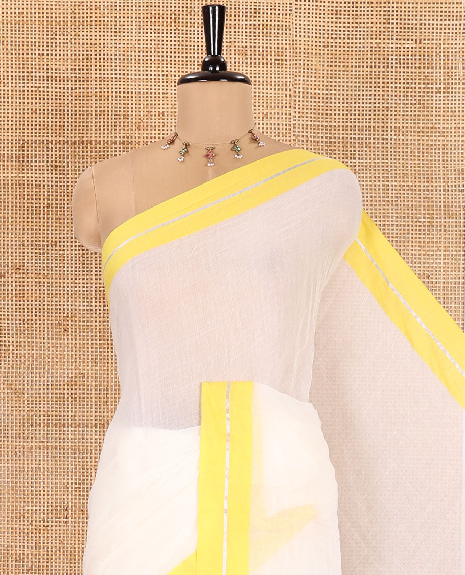 Cream and Yellow Plain Khadi Mul Cotton Saree, Complemented by Contrast Horizontal Striped Border, Plain Pallu, and Paired with a Matching Blouse