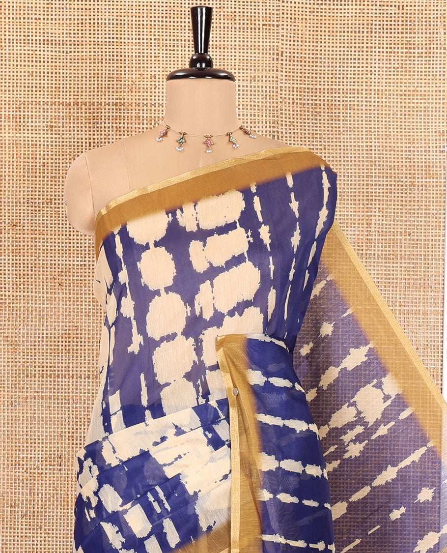 Navy Blue Mercerised Cotton Saree, Embellished with Shibori Printed on Its Body, Complemented by a Contrast Border, Pallu Steeped with Colorful Floral Print, and Paired with a Contrast Printed Blouse