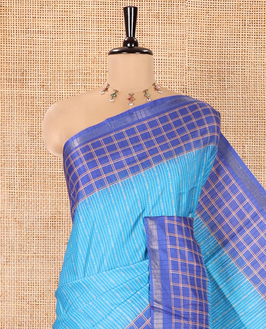 Blue Katan Silk Saree, Adorned with Vaira-Oosai-Style Stripes on Its Body, Complemented by a Contrast-Checked Border, Pallu of Jaal Designs, and Paired with a Contrast Blouse
