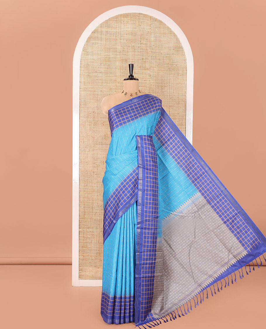 Blue Katan Silk Saree, Adorned with Vaira-Oosai-Style Stripes on Its Body, Complemented by a Contrast-Checked Border, Pallu of Jaal Designs, and Paired with a Contrast Blouse