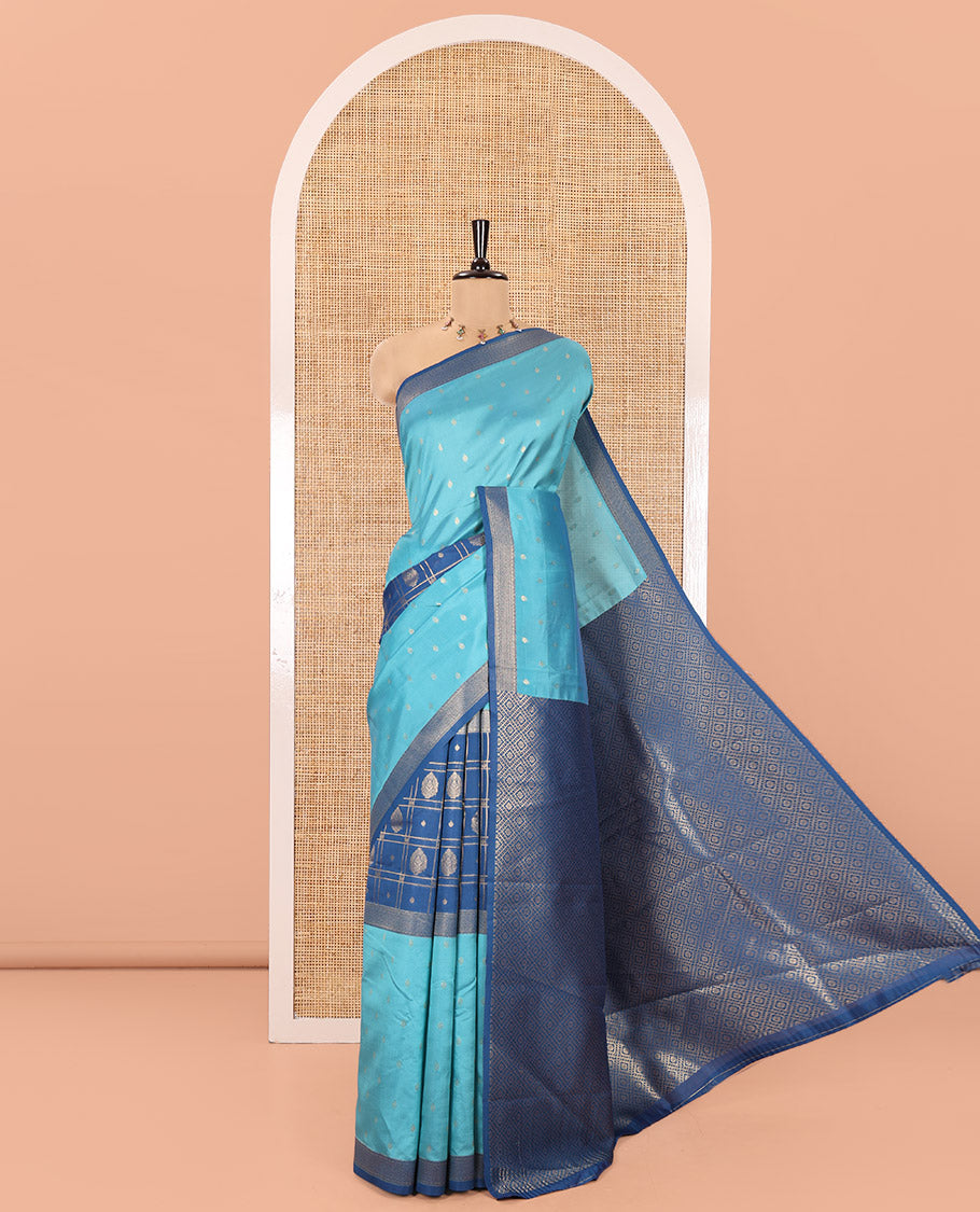 Blue and Navy Blue Kanchi Silk Saree, Subtly Enriched with Zari Buttas and Buttas Enclosed Checks On Its Body, Complemented by Zari Border, Jaal Pallu, and Paired with a Contrast Jacquard Blouse