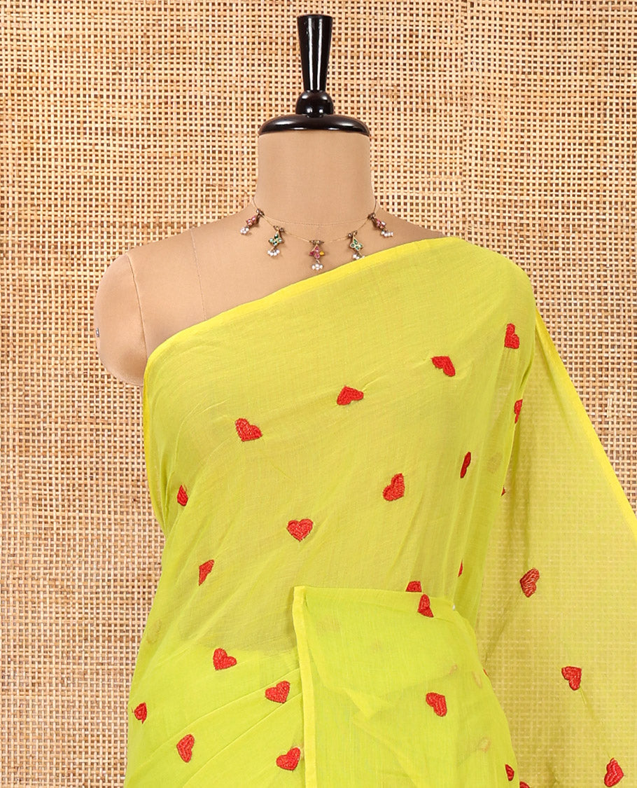 Borderless Parrot Green Mul Cotton Saree, Delicately Woven with Heart Motifs Embroidered All Over Its Body, a Self-Pallu, and Paired with a Matching Blouse
