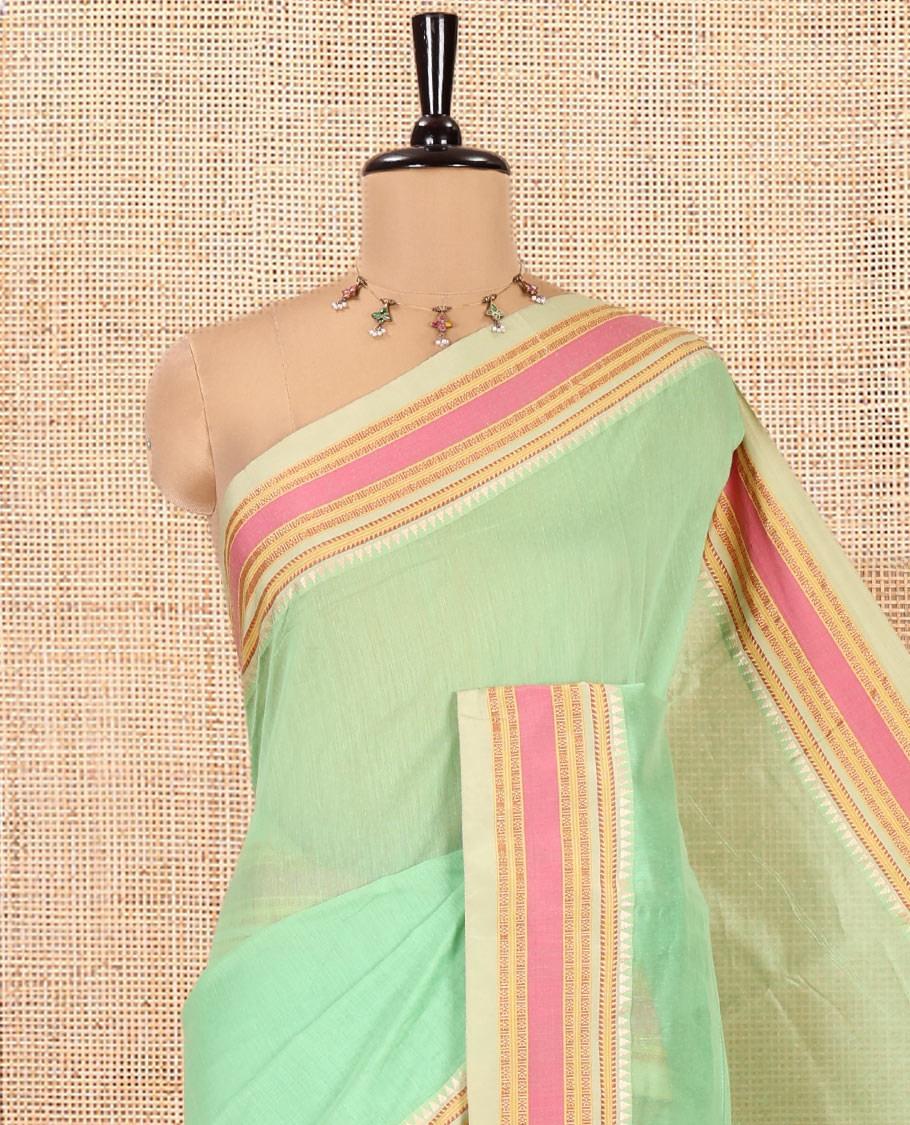 Parrot Green Plain Mercerised Cotton Saree, Complemented by Contrast Traditional Border, Striped Pallu, and a Matching Blouse